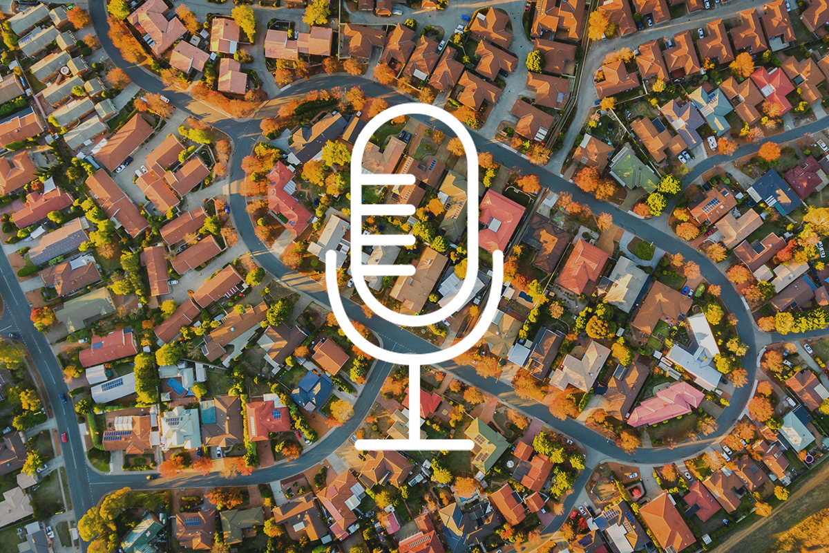 aerial view of neighborhood with microphone icon