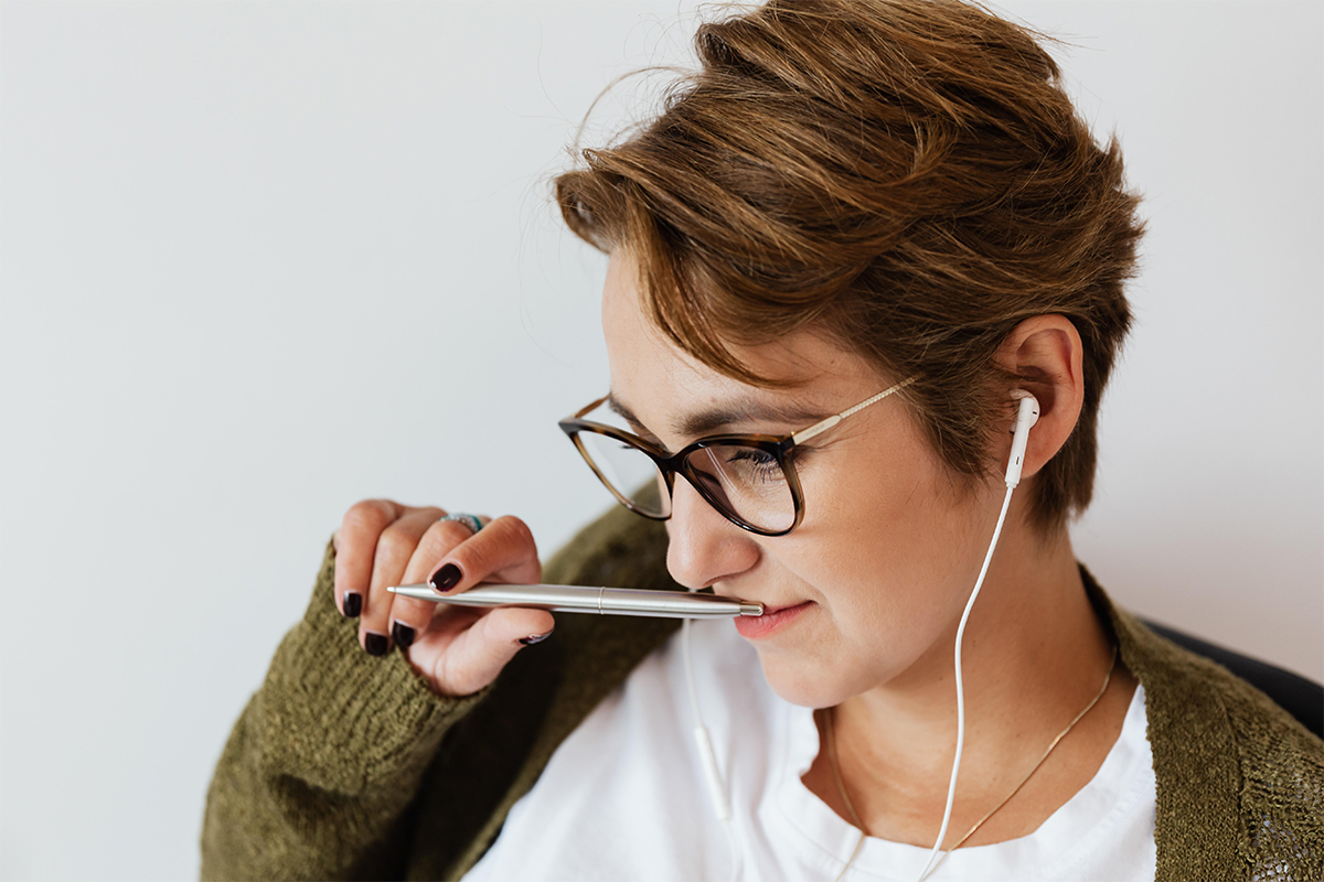 woman listening to headphones